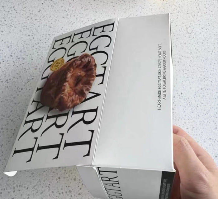 WhatsApp chat with food industry buyer regarding custom printed packaging boxes